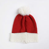 Cappello con pompon umano (multicolore)